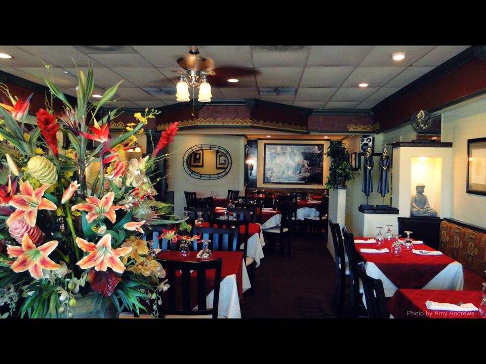 Dinning area with flowers on the left.